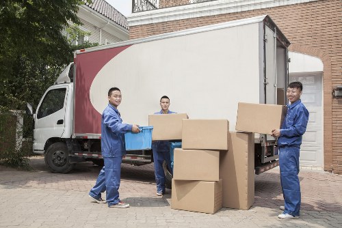 Furniture and boxes being loaded into a van for a North London move