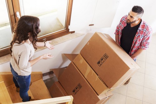 Prepared boxes and furniture loaded for a move near Gospel Oak